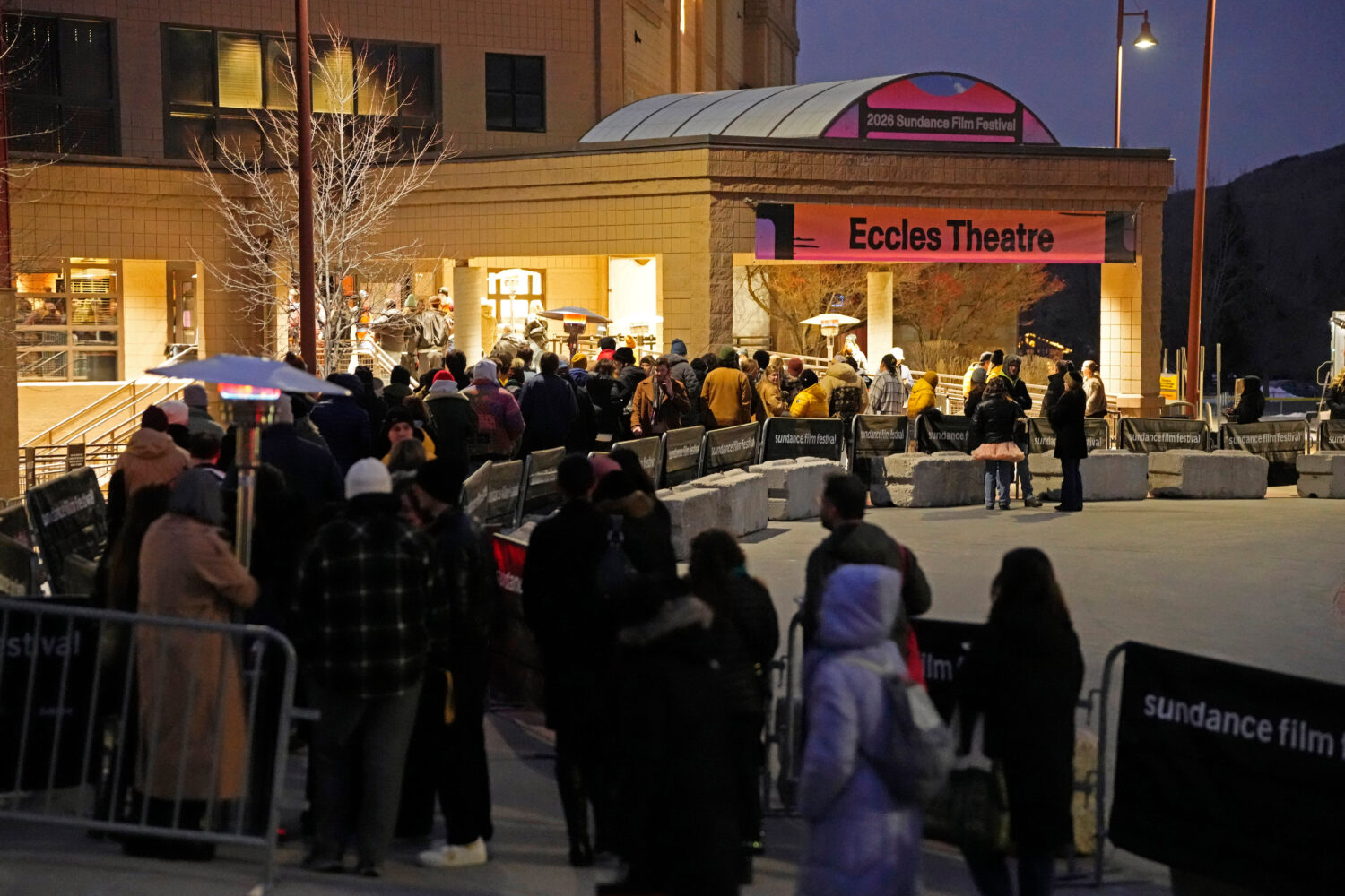 Audience members line up outside the Eccles Theatre during the Sundance Film Festival on Friday, Ja...