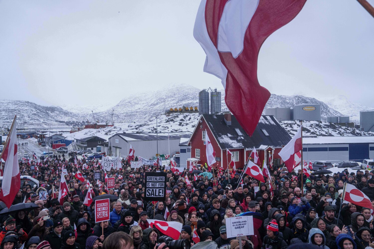 People protest against Trump's policy towards Greenland in front of the US consulate in Nuuk, Green...