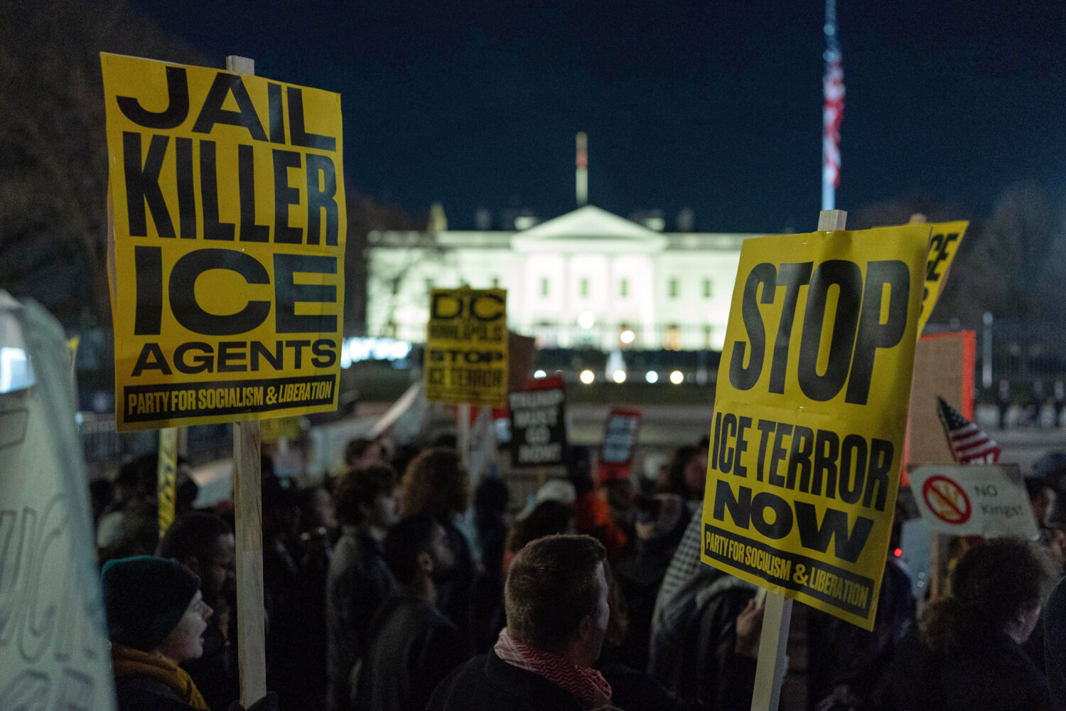 Demonstrators protest outside the White House in Washington, Thursday, Jan. 8, 2026, against the Im...