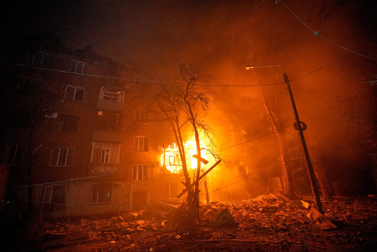 A residential building burns after a Russian strike in Kryvyi Rih, Ukraine, Thursday, Jan. 8, 2026....