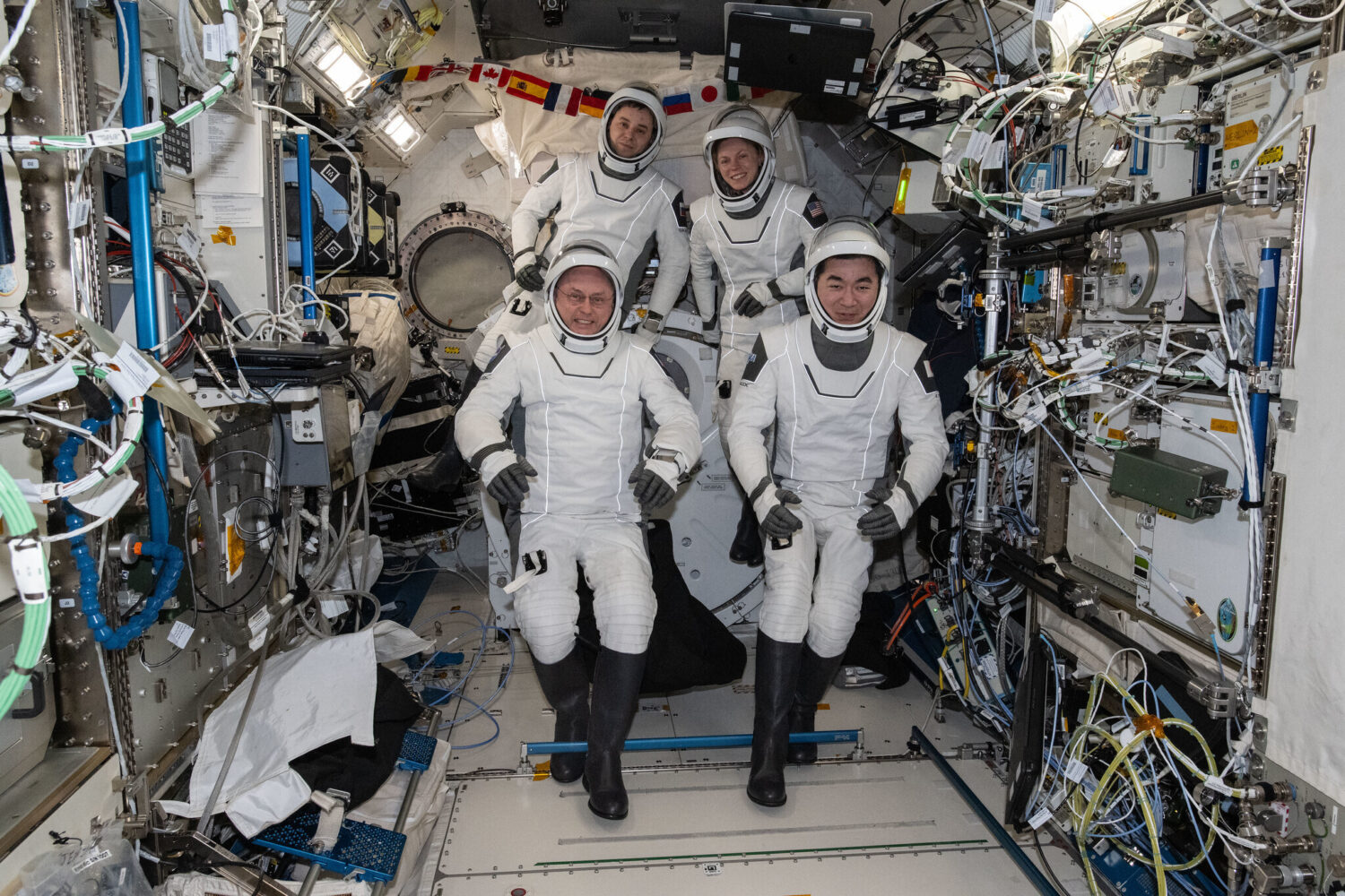 This photo provided by NASA shows clockwise from bottom left are, NASA astronaut Mike Fincke, Rosco...