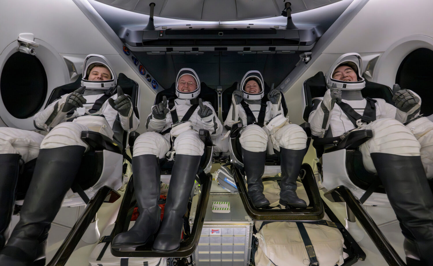 Roscosmos cosmonaut Oleg Platonov, left, NASA astronauts Mike Fincke, Zena Cardman, and JAXA (Japan...