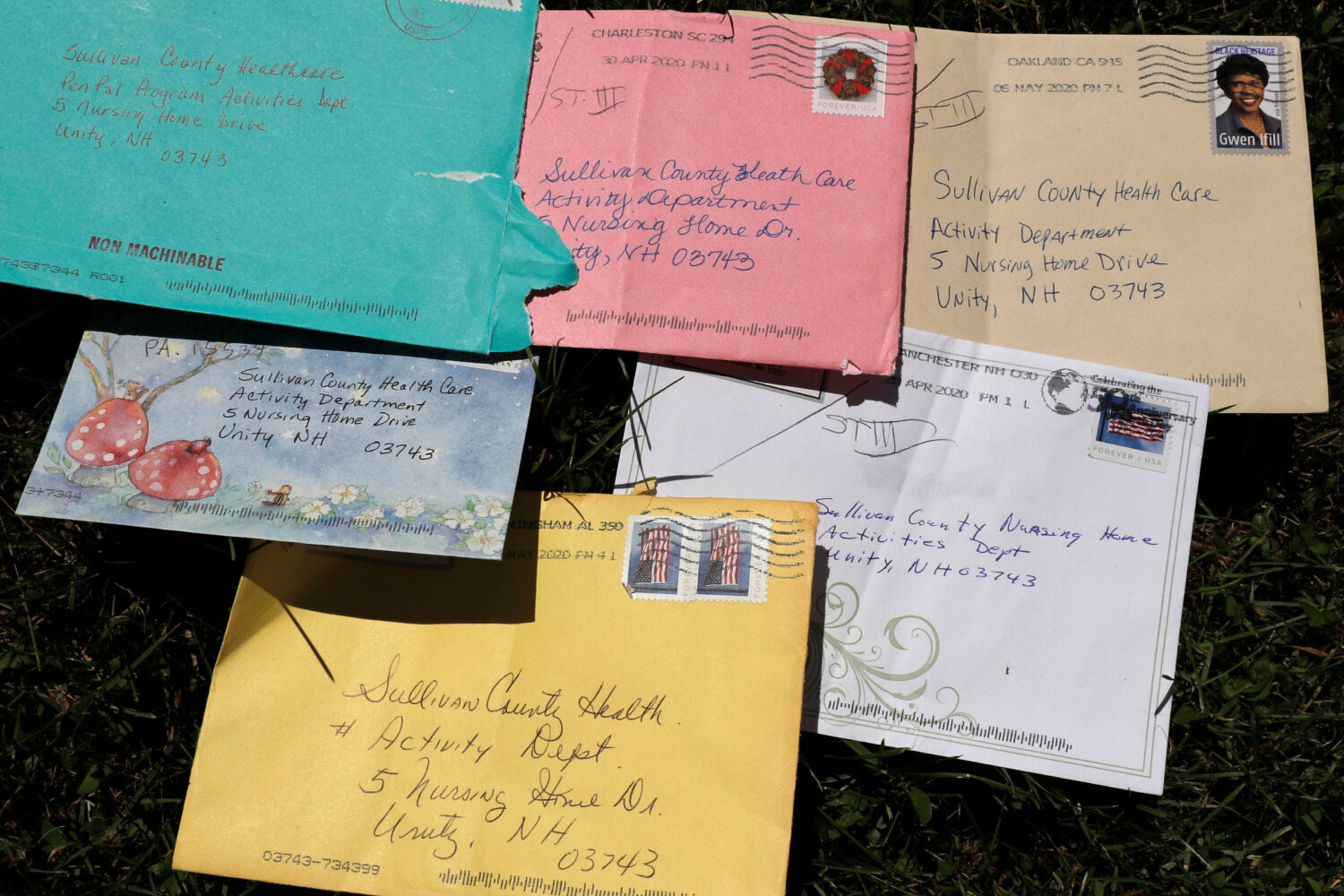 Pen pal letters are displayed outside the Sullivan County Health Care nursing home in Unity, N.H., ...