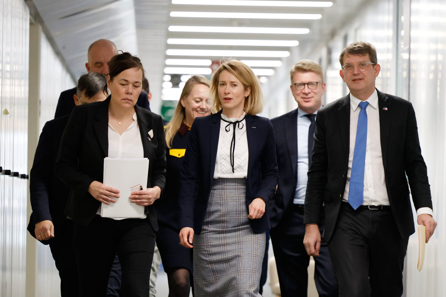 European Union foreign policy chief Kaja Kallas, center, walks with Minister for Foreign Affairs an...