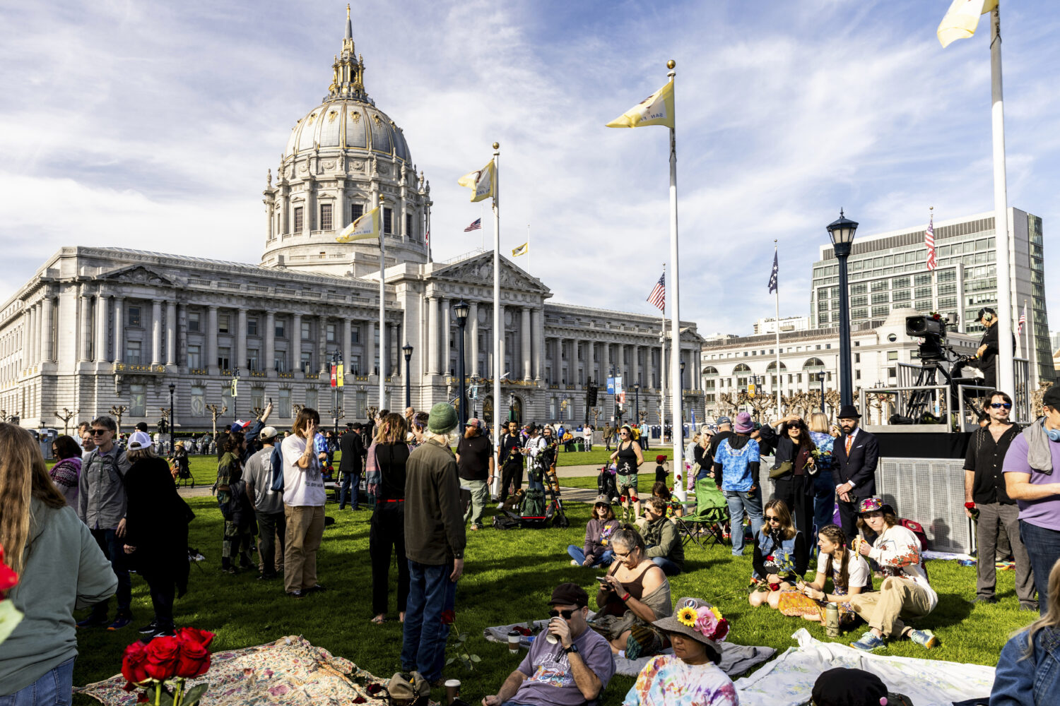 Attendees gather at Civic Center Plaza ahead of a public memorial for Grateful Dead co-founder Bob ...