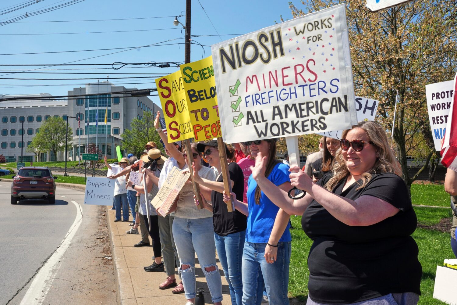 FILE - People rally on Wednesday, April 23, 2025, in support of some 185 researchers and other empl...
