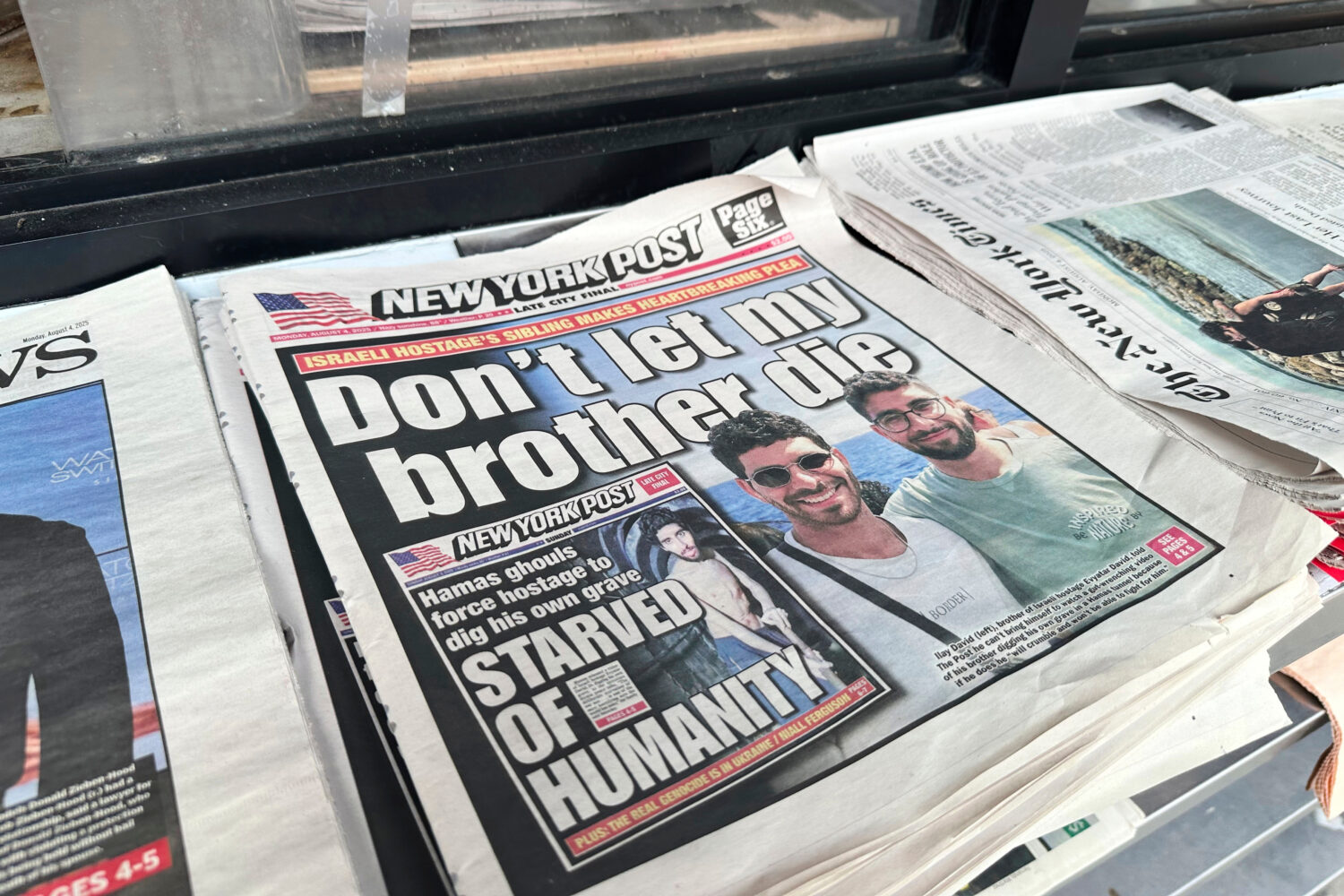 FILE - The New York Post is seen at a newsstand in Manhattan, Aug. 4, 2025. (AP Photo/Jennifer Pelt...