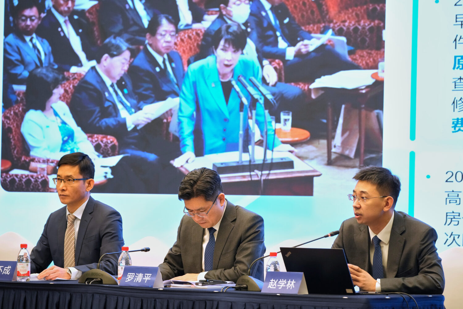 From left to right, Dan Huaicheng, secretary-general of China Arms control and Disarmament Associat...