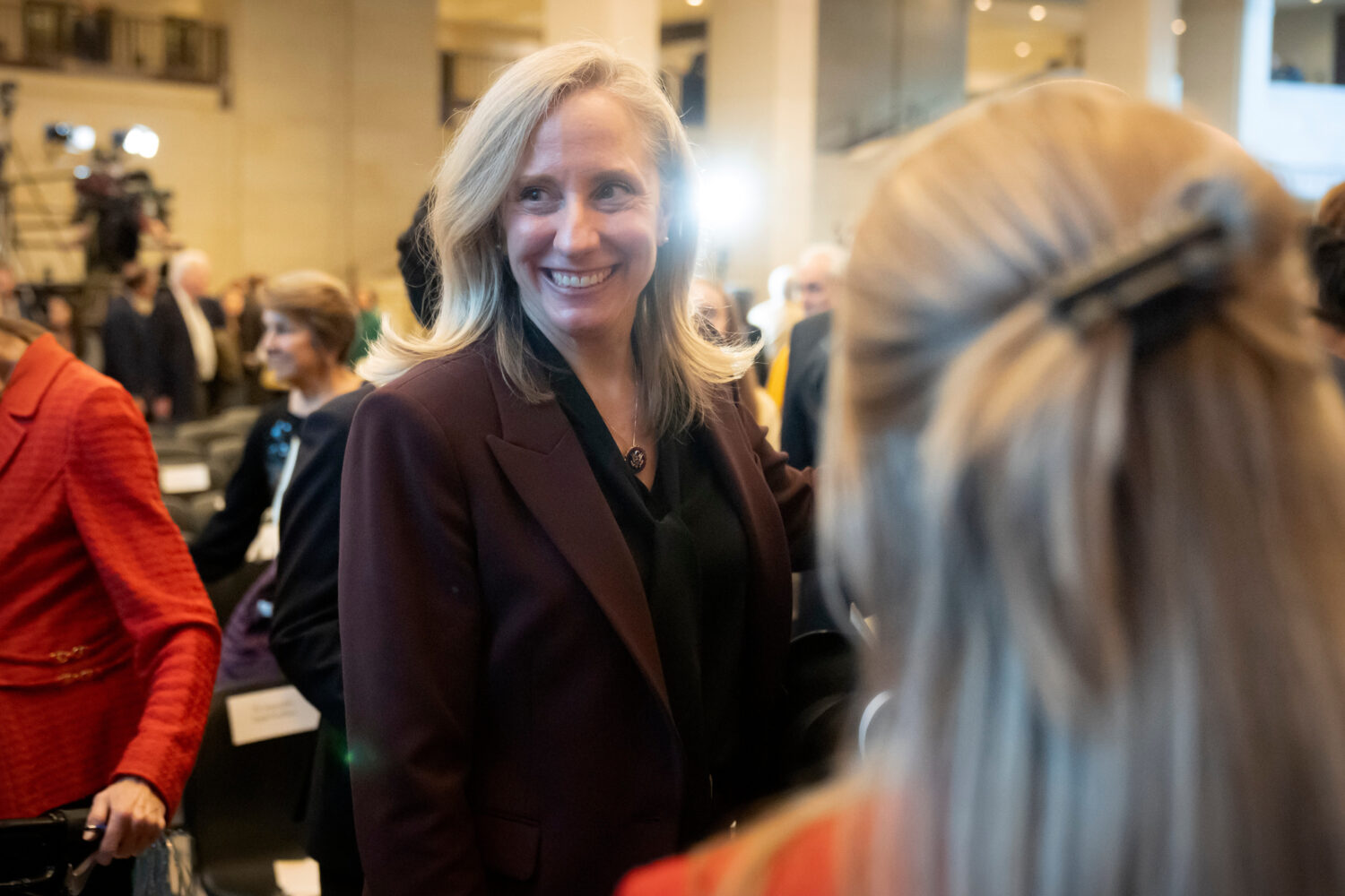 Virginia Gov.-elect Abigail Spanberger greets visitors at a ceremony to dedicate a statue of Virgin...