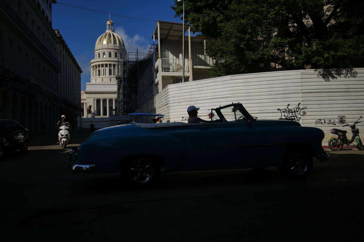 A man drives a classic American car in front of the Capitol in Havana, Monday, Jan. 26, 2026. (AP P...