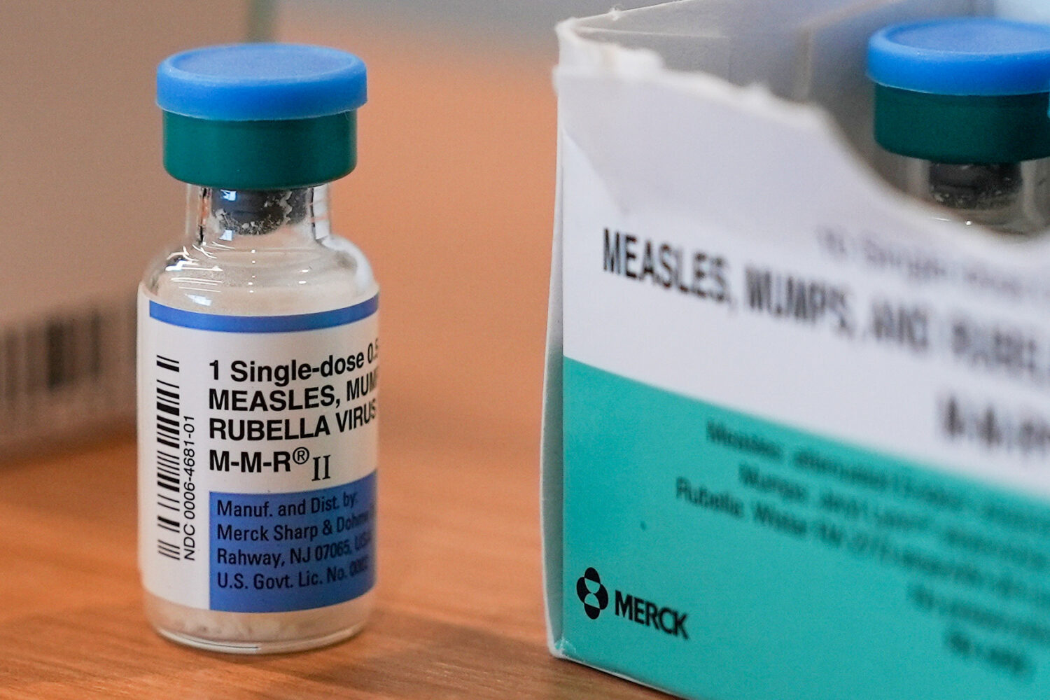 FILE - A vial of the measles, mumps and rubella vaccine is on display at the Lubbock Health Departm...