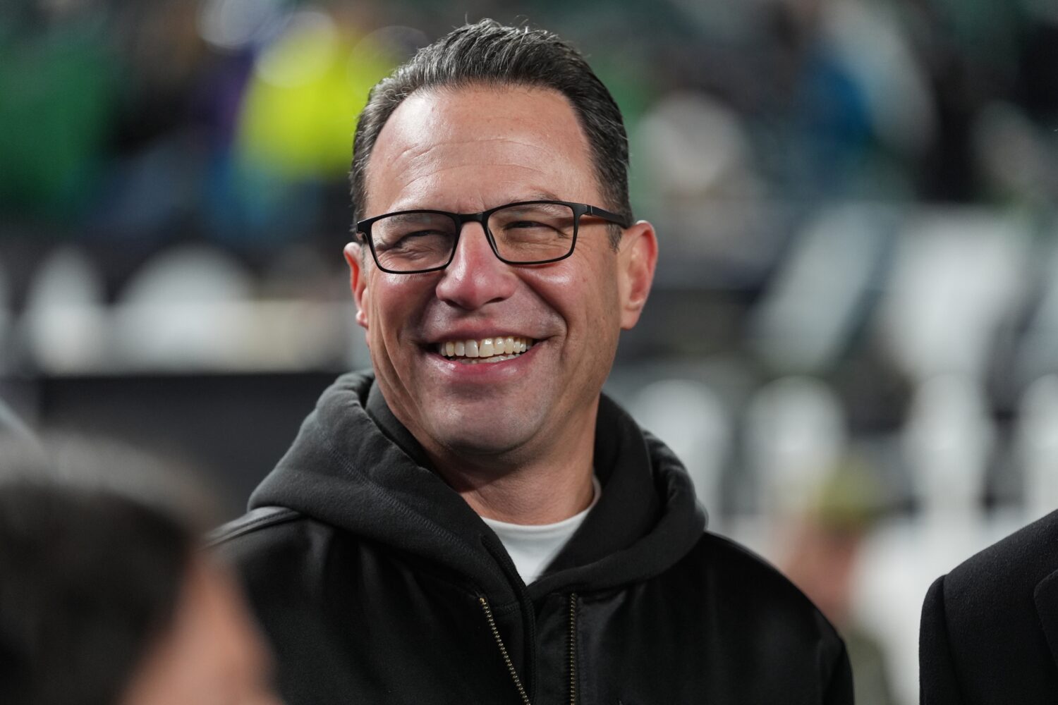 FILE - Pennsylvania Gov. Josh Shapiro watches warm ups before an NFL football game between the Phil...
