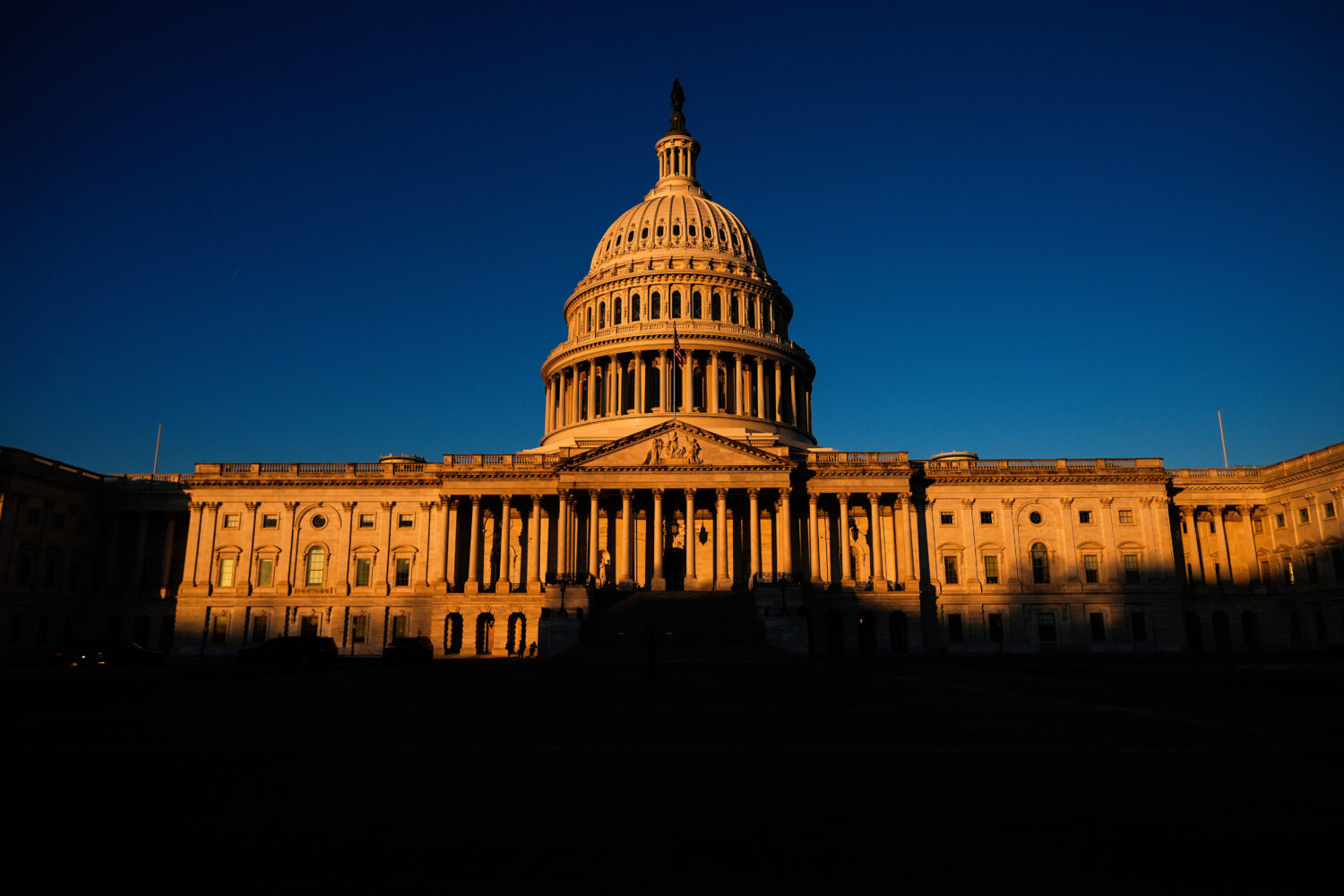 FILE - The U.S. Capitol is seen shortly after sunrise, Dec. 16, 2025, in Washington. (AP Photo/Juli...