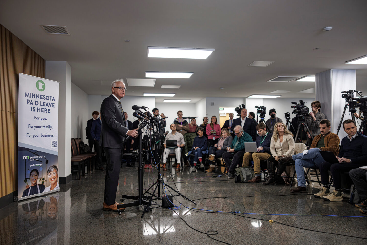 Minnesota Gov. Tim Walz responds to questions from reporters regarding whether he will seek a third...