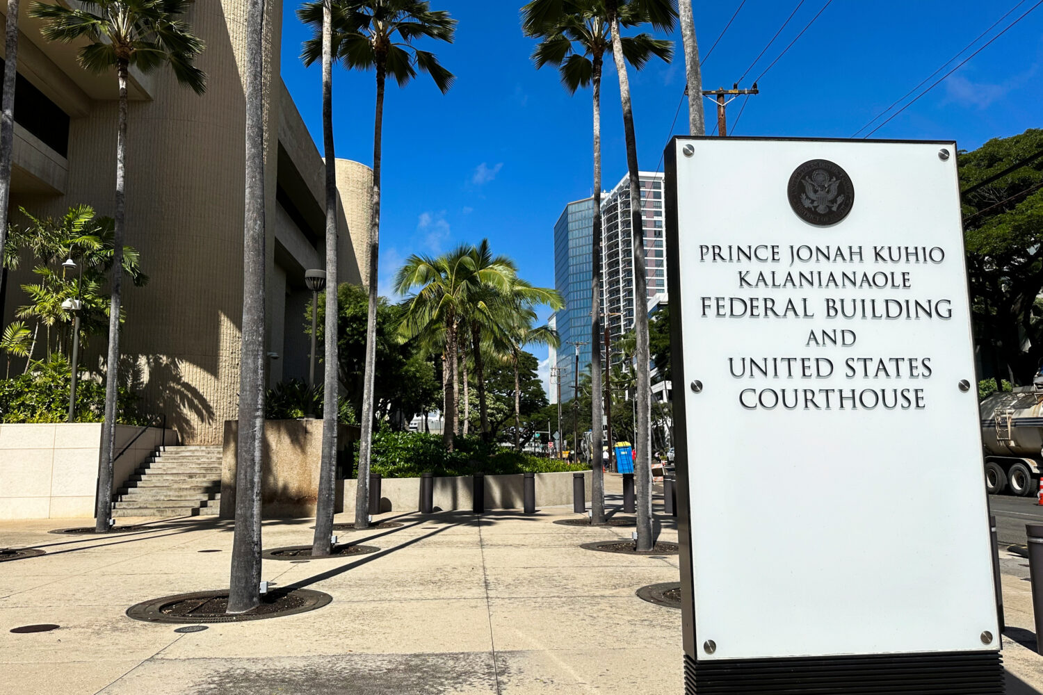FILE - A sign for the Prince Jonah Kuhio Kalanianaole Federal Building and Courthouse is displayed ...
