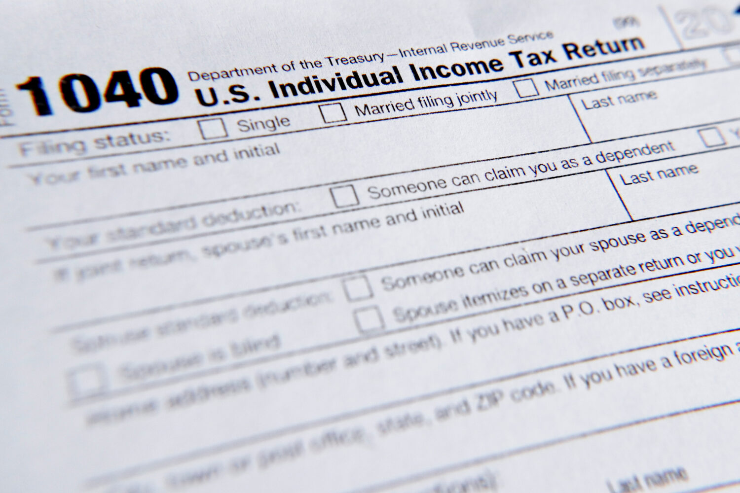 FILE - A 1040 tax form printed from the Internal Revenue Service web page is seen, Feb. 13, 2019, i...