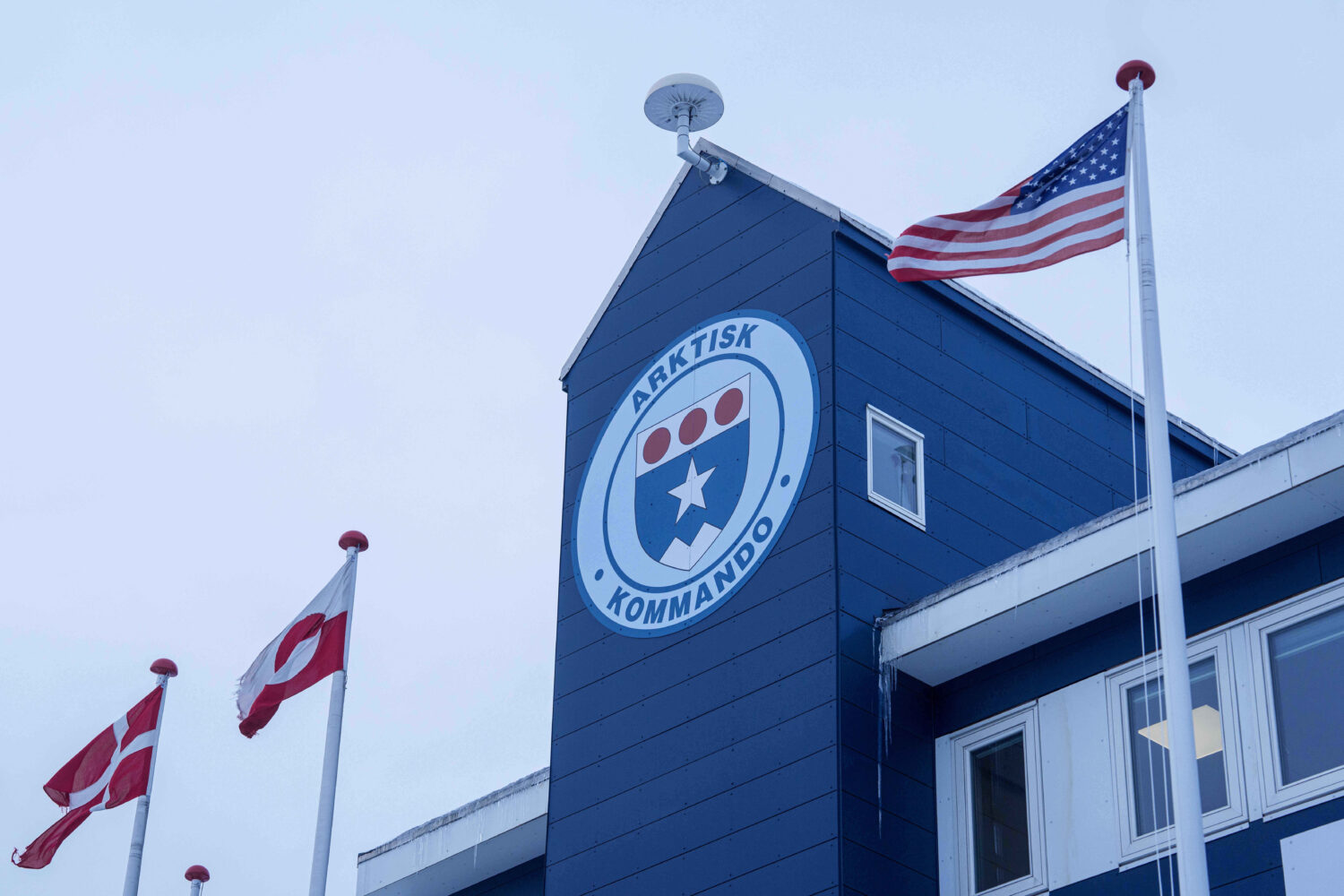 Danish, Greenlandic and US flags are seen at Joint Arctic Command center in Nuuk, Greenland, on Fri...
