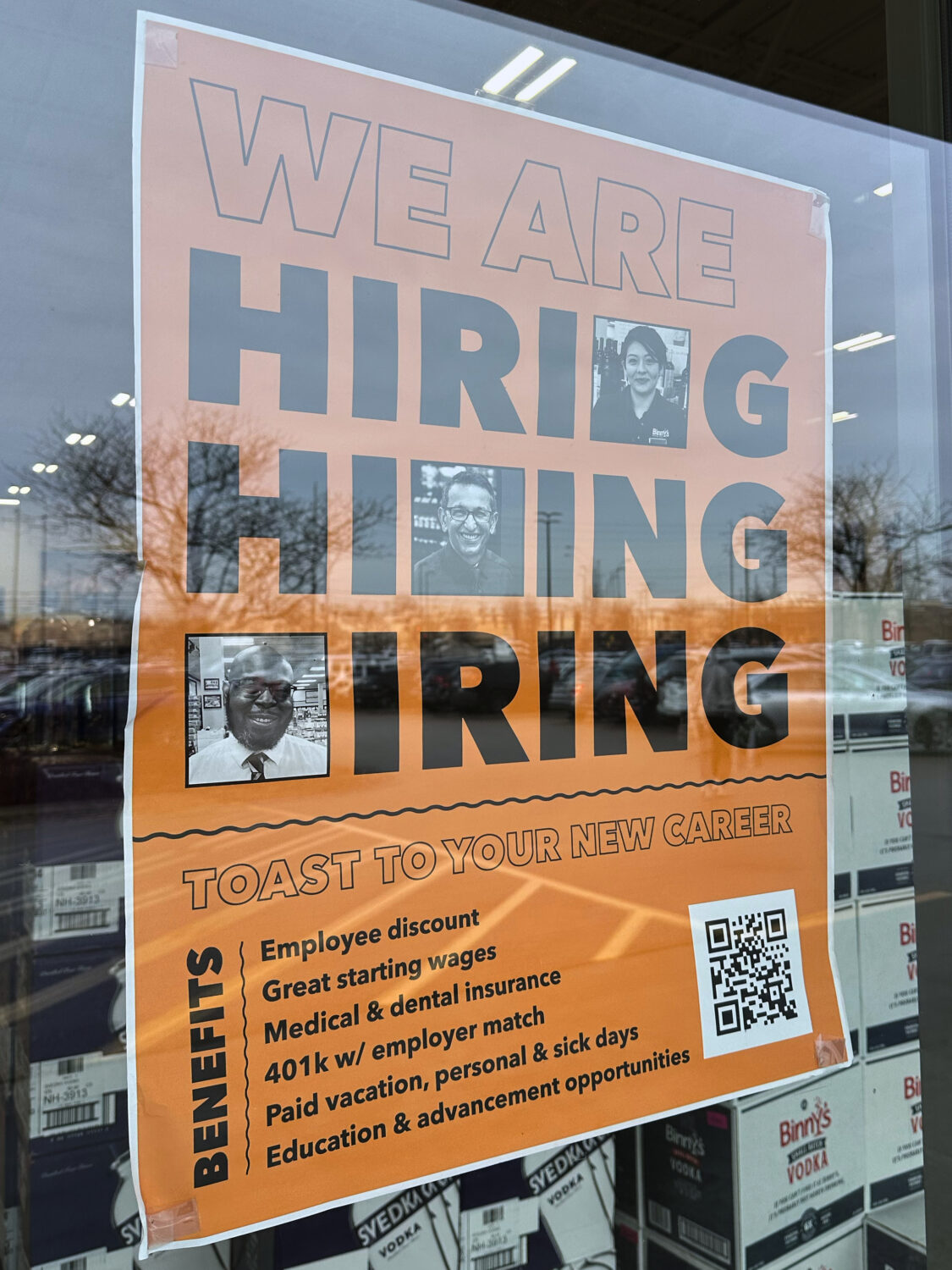Hiring sign is displayed at a grocery store in Arlington Heights, Ill., Wednesday, Dec. 24, 2025. (...