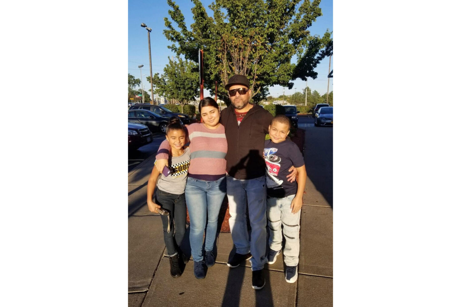 This undated photo provided by Jeanette Pagan-Lopez shows Geraldo Lunas Campos with his three child...