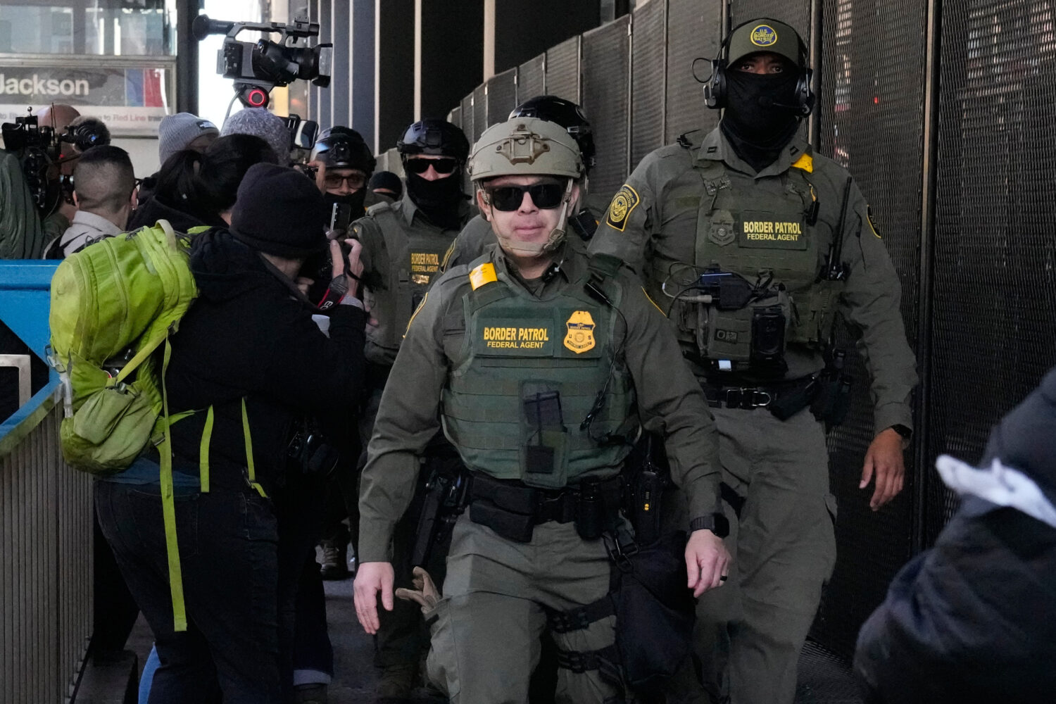 FILE - U.S. Customs and Border Patrol agents arrive to escort U.S. Customs and Border Patrol Gregor...