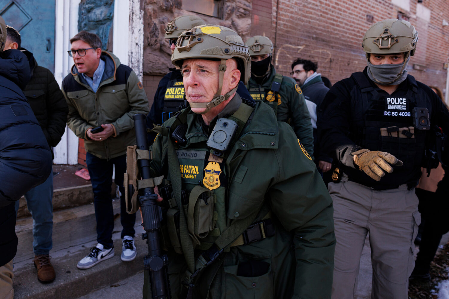 FILE - Border Patrol Cmdr. Gregory Bovino walks alongside his agents in the Little Village neighbor...