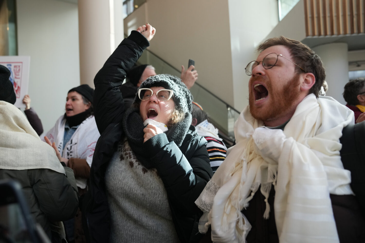 Protesters against Federal immigration agents gather at Target, Friday, Jan. 23, 2026, in Minneapol...