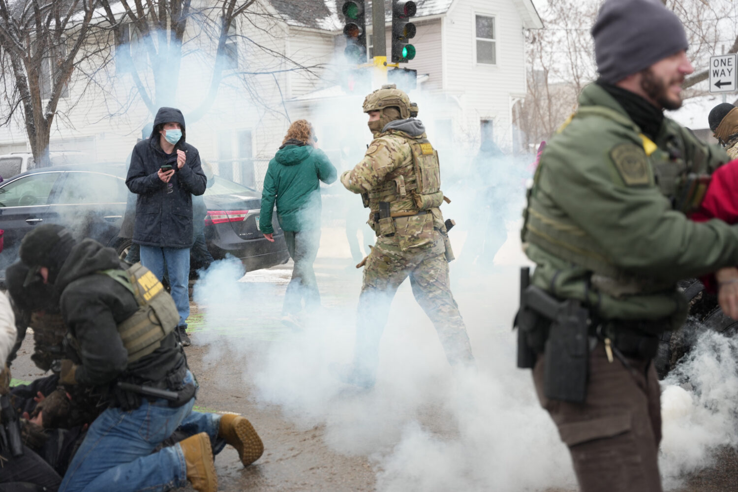Tear gas is deployed as Federal agents make arrests on Wednesday, Jan. 21, 2026, in Minneapolis. (A...