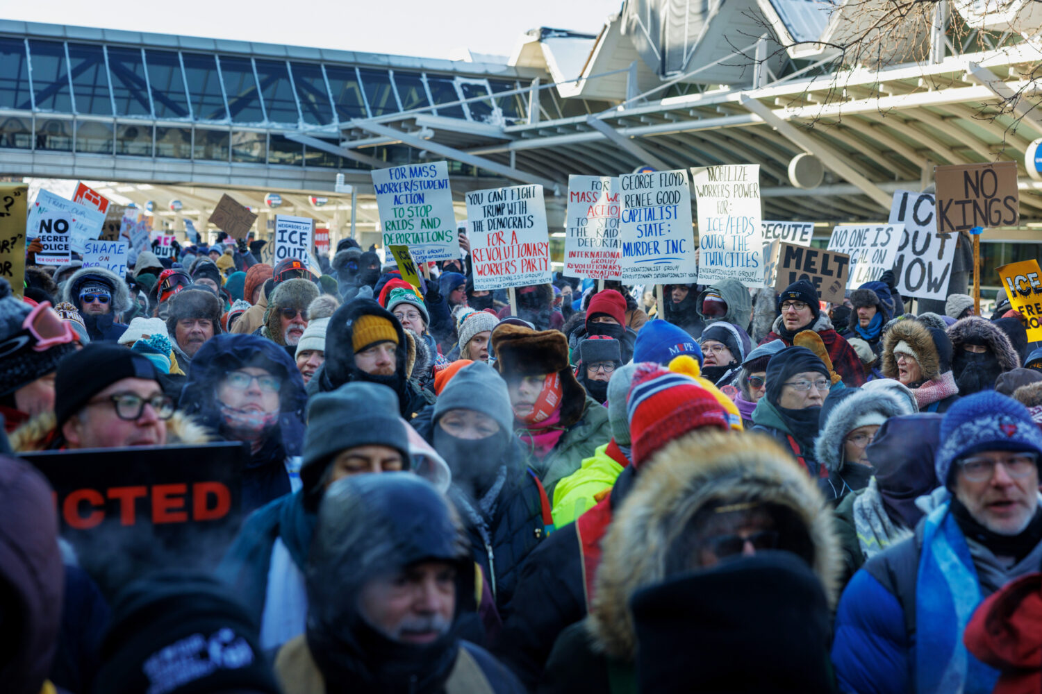 Clergy members and community activists gather at the Minneapolis-St. Paul International Airport, to...