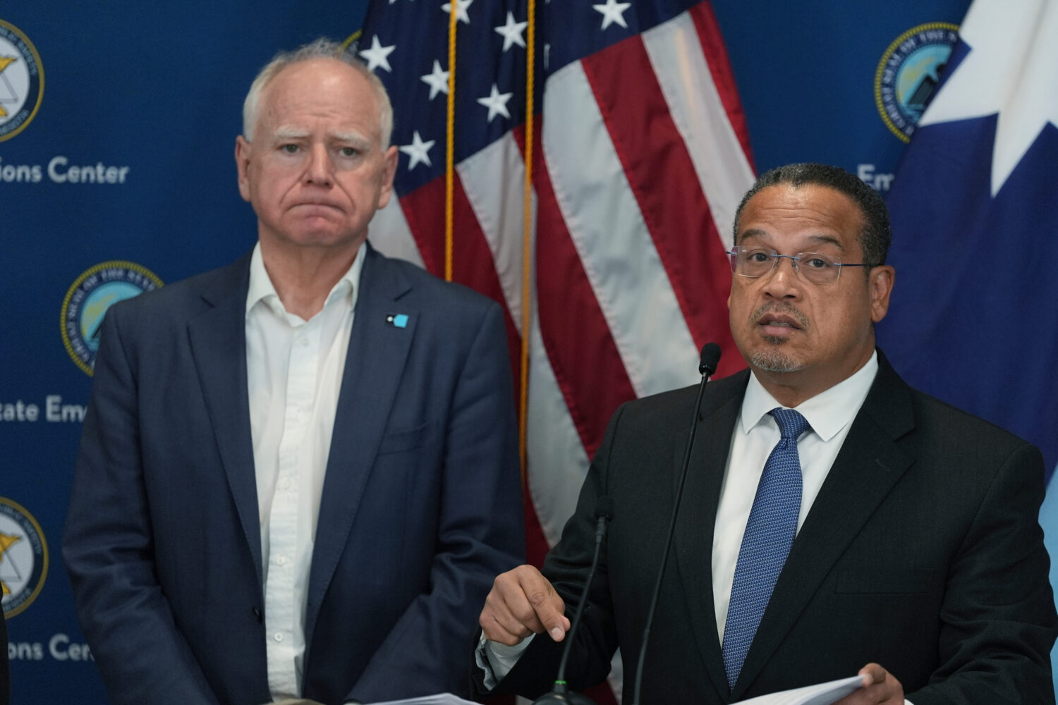 Attorney General Keith Ellison, right, and Minnesota Gov. Tim Walz give a news conference in Blaine...