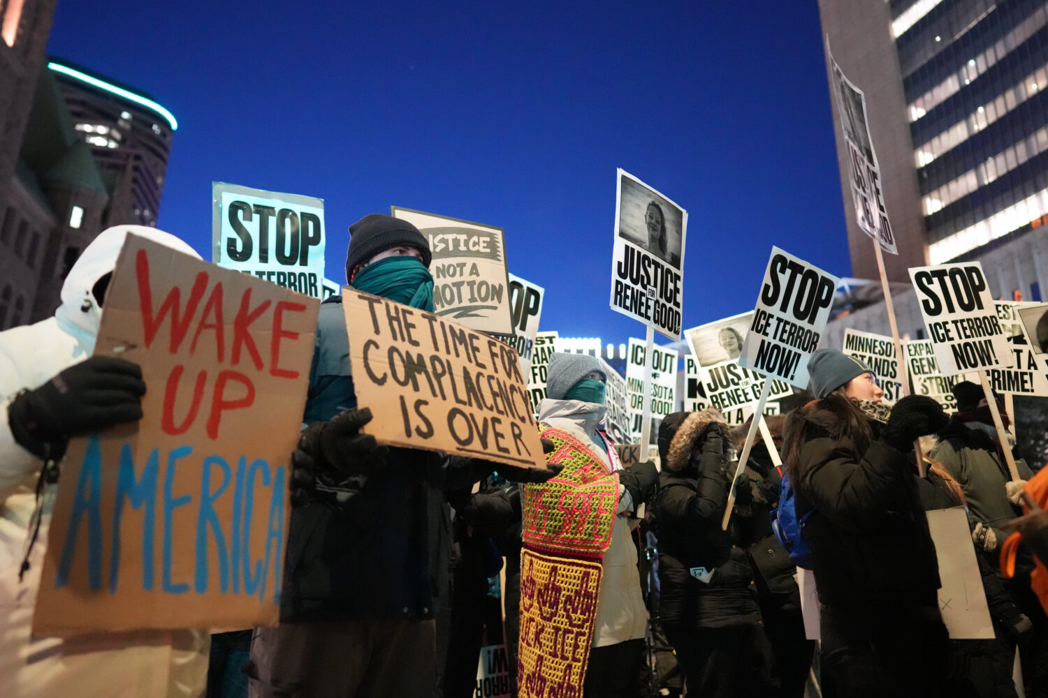 Demonstrators gather during a rally against federal immigration enforcement at Federal Courthouse P...