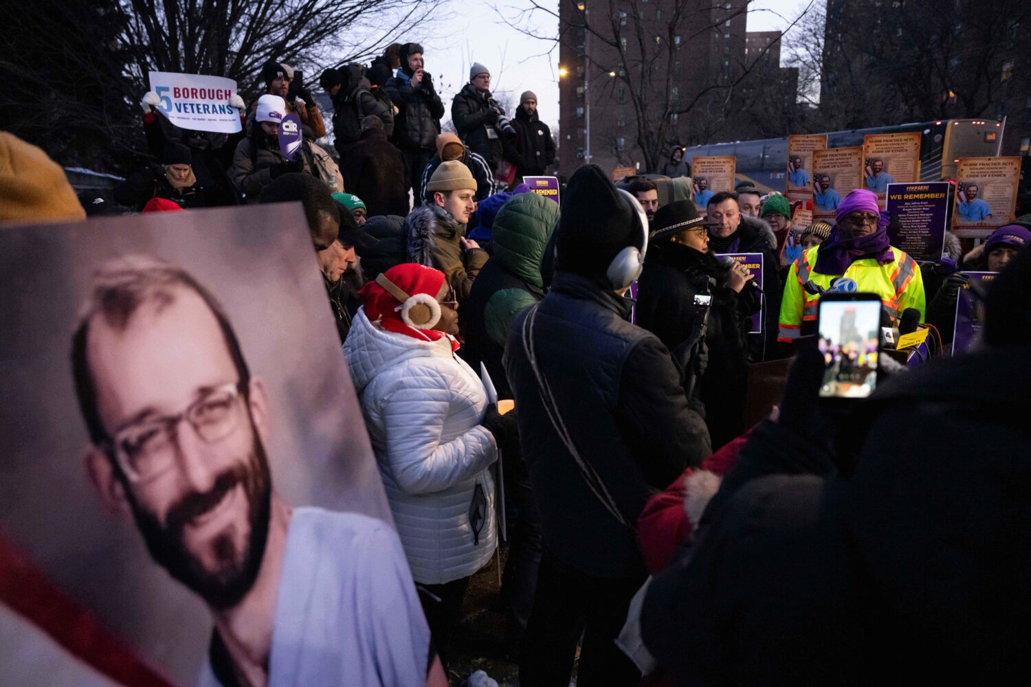 A photo of Alex Pretti is displayed during a vigil for Alex Pretti by nurses and their supporters o...