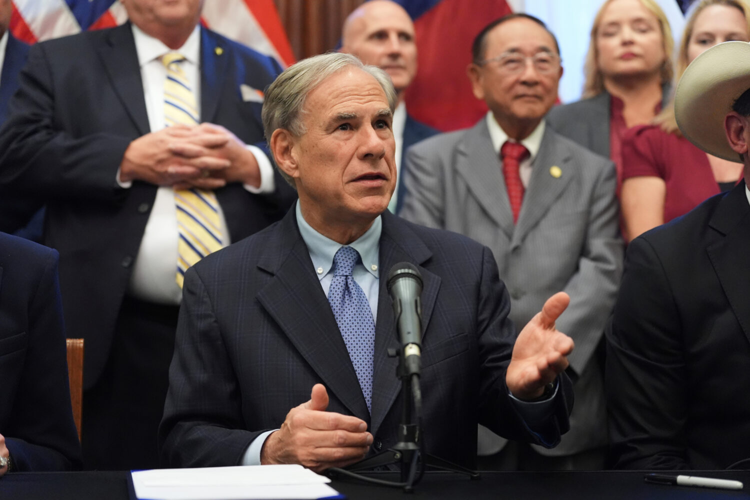 FILE - Texas Gov. Greg Abbott speaks to the media at the Texas Capitol in Austin, Texas, Aug. 22, 2...