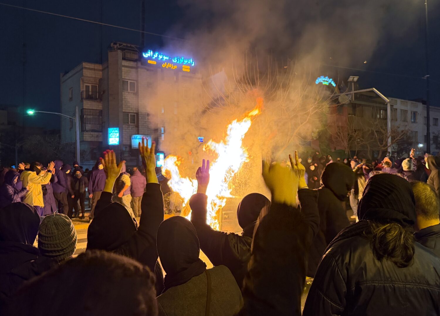 FILE - In this photo obtained by The Associated Press, Iranians attend an anti-government protest i...
