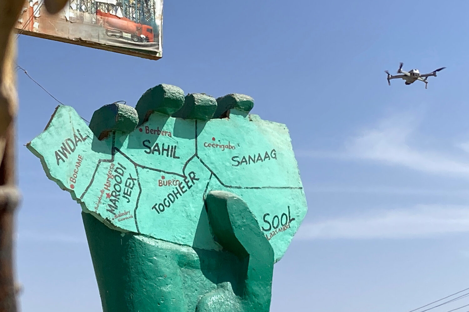 A drone buzzes over a statue in the Somaliland capital of Hargeisa, Feb. 9, 2022. (AP Photo/Cara An...