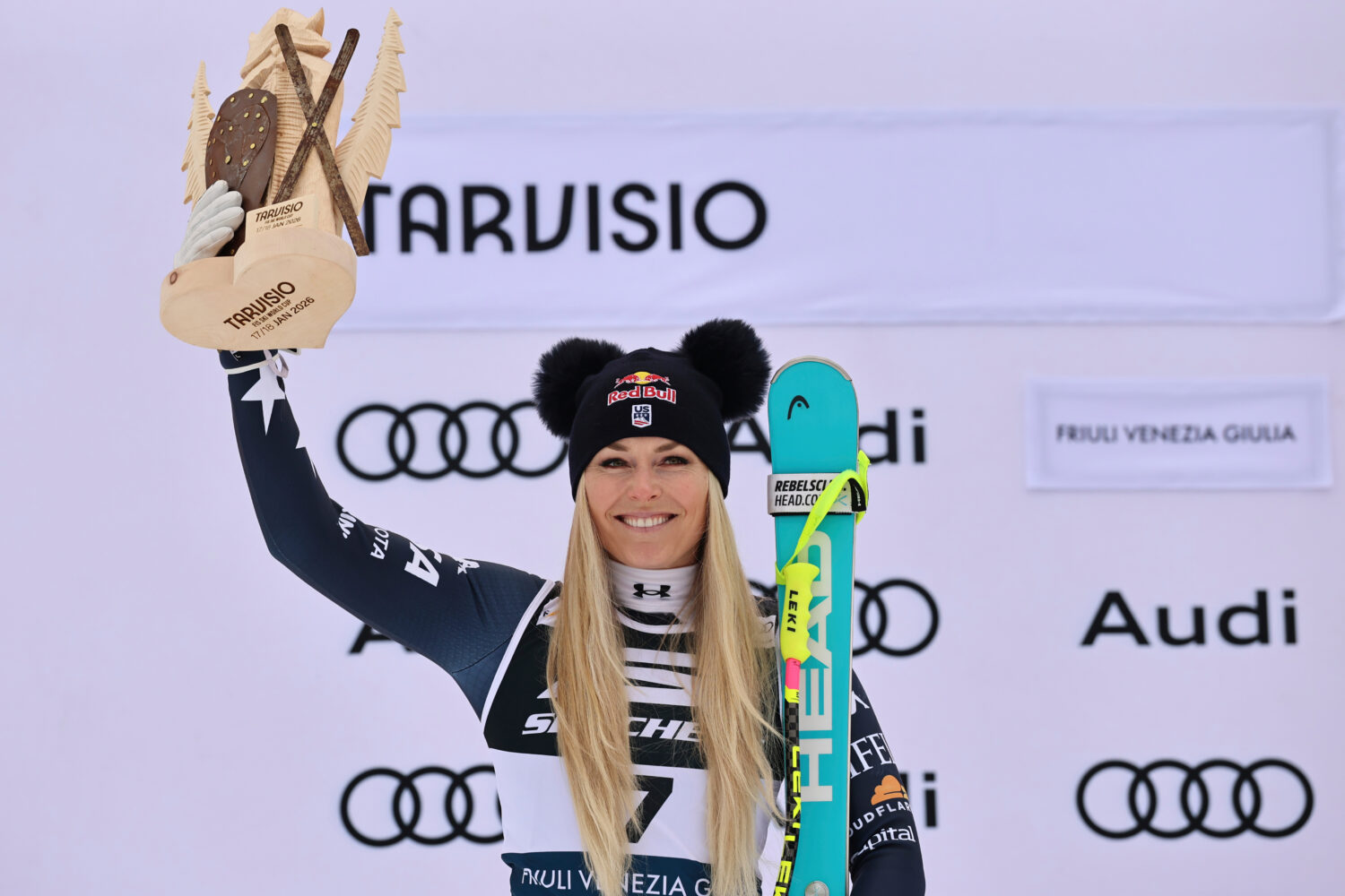 United States' Lindsey Vonn celebrates on the podium after taking second place in an alpine ski, wo...