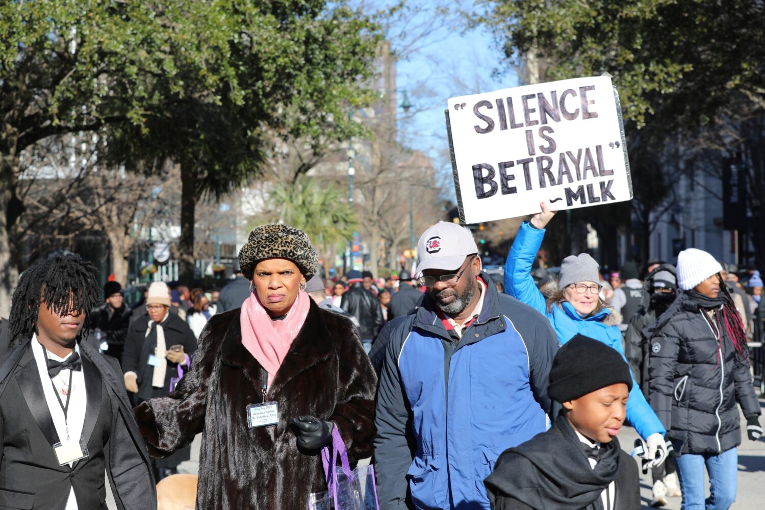 FILE - A marcher holds up a sign at a march and rally at the South Carolina Statehouse to honor Mar...