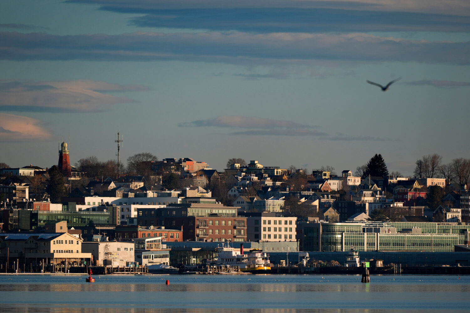 FILE - Buildings on the working waterfront catch the early morning light, Feb. 26, 2025, in Portlan...