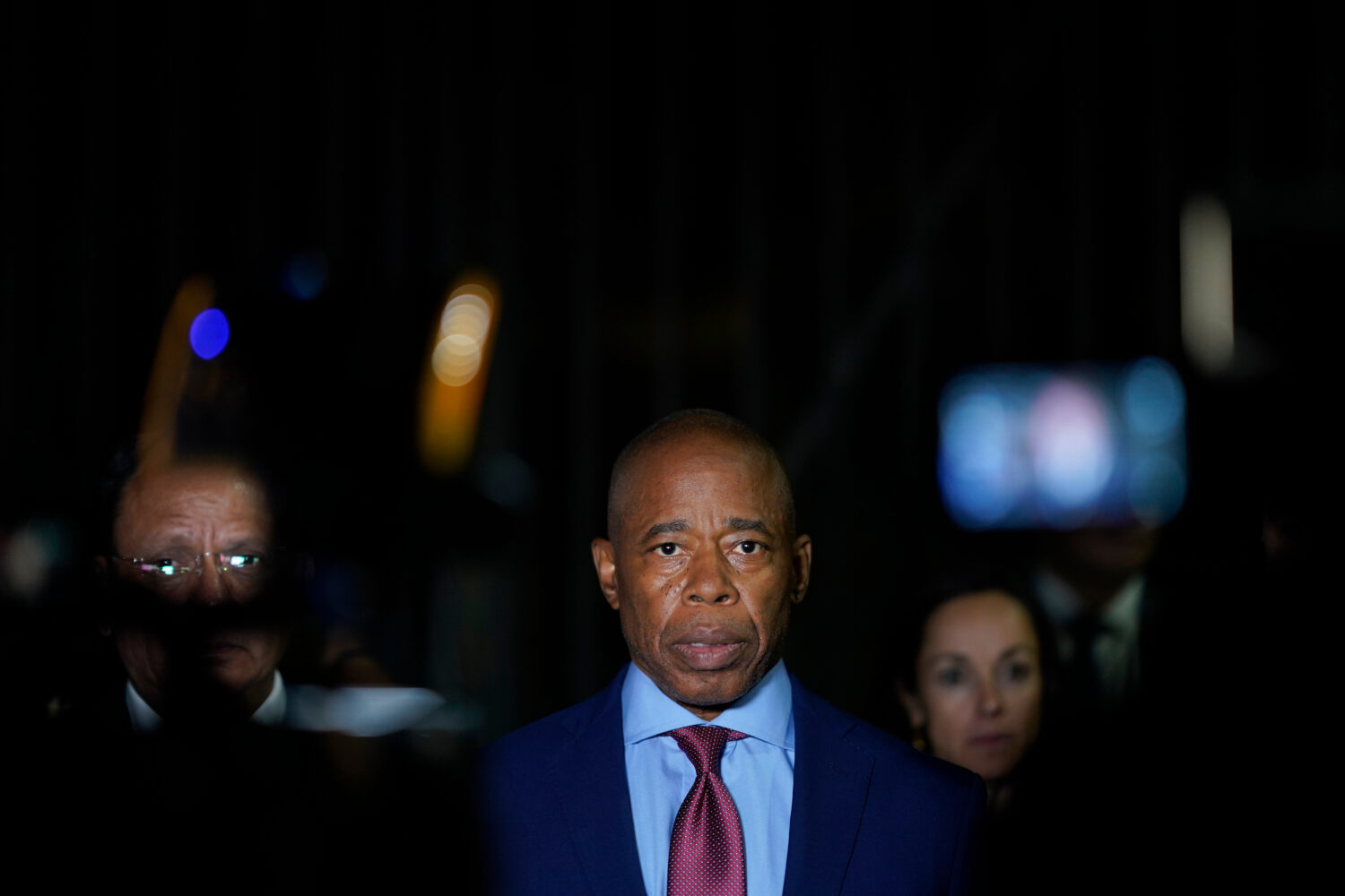 FILE - New York City Mayor Eric Adams talks to the press in front of the Basilica of Our Lady of Gu...