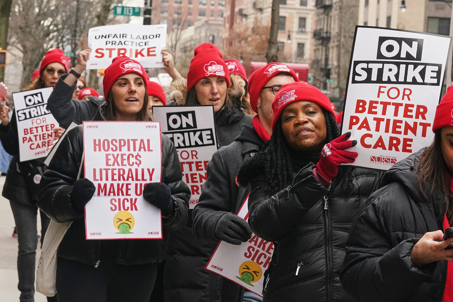 Striking nurses demonstrate outside Mt. Sinai Morningside Hospital, in New York, Wednesday, Jan. 14...