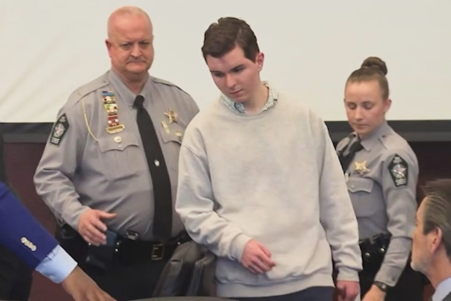 This image taken from video provided by WRAL-TV shows Austin Thompson attending a hearing in Wake S...