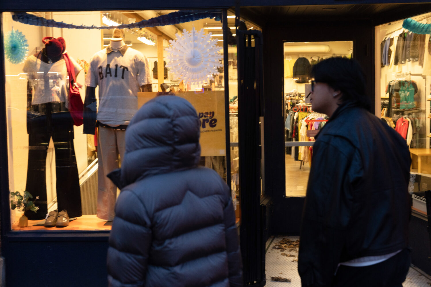 People walk by a shop on Tuesday, Jan. 6, 2026, in Portland, Ore. (AP Photo/Jenny Kane)Credit: ASSO...