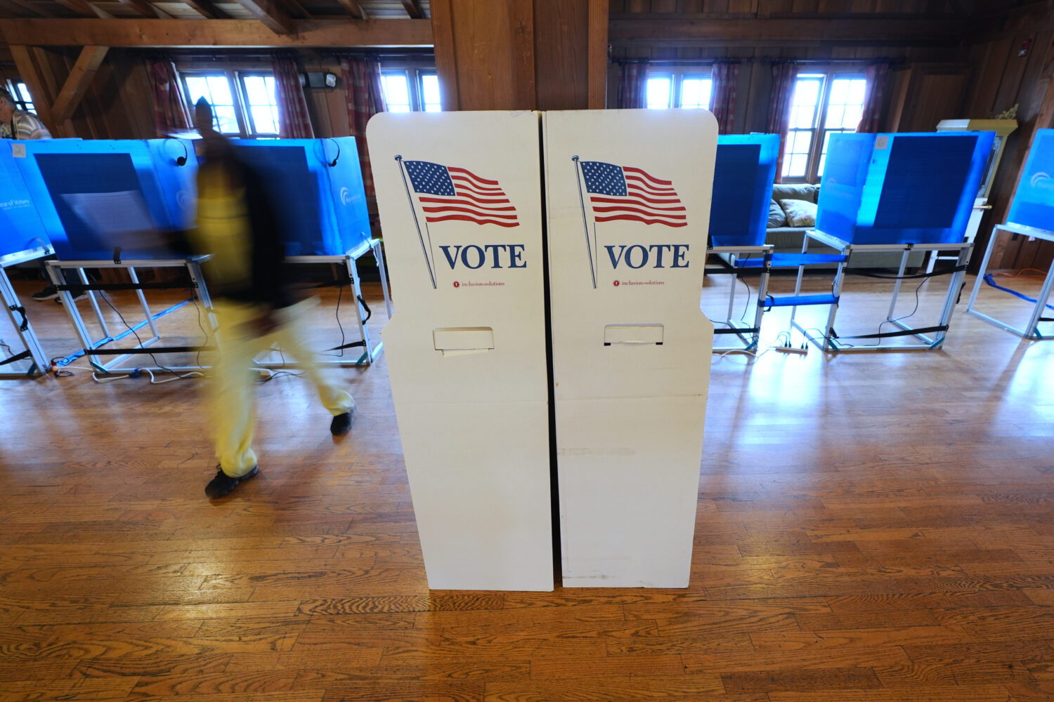 FILE - Signs welcomes voters Nov. 4, 2025, in Del Mar, Calif. (AP Photo/Gregory Bull, File)Credit: ...