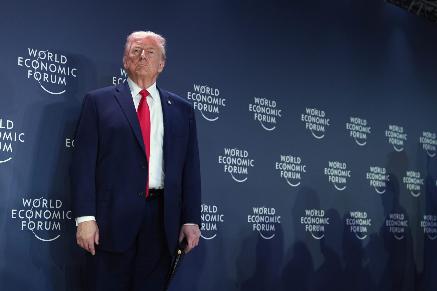 President Donald Trump stands on the stage prior to addressing a meeting of Global Business Leaders...