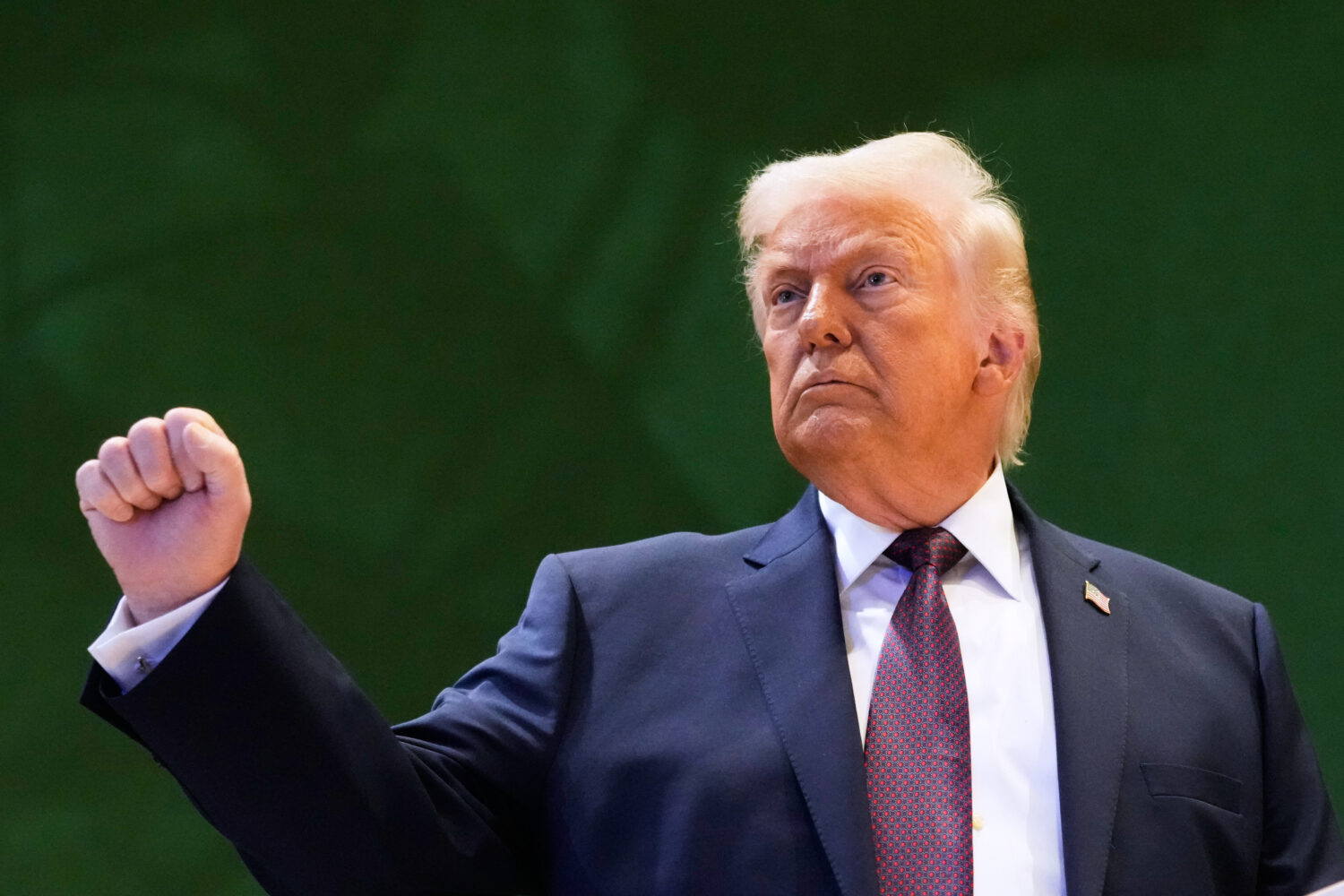 US President Donald Trump leaves after a signing ceremony of his Board of Peace initiative at the A...
