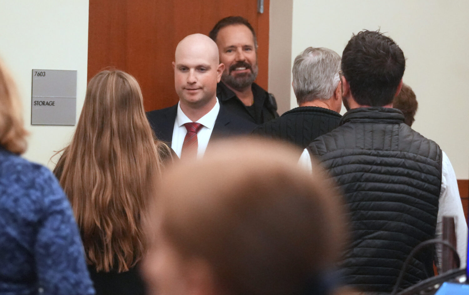 FILE - Blendon Township police officer Connor Grubb greets a family member Nov. 21, 2025 after the ...