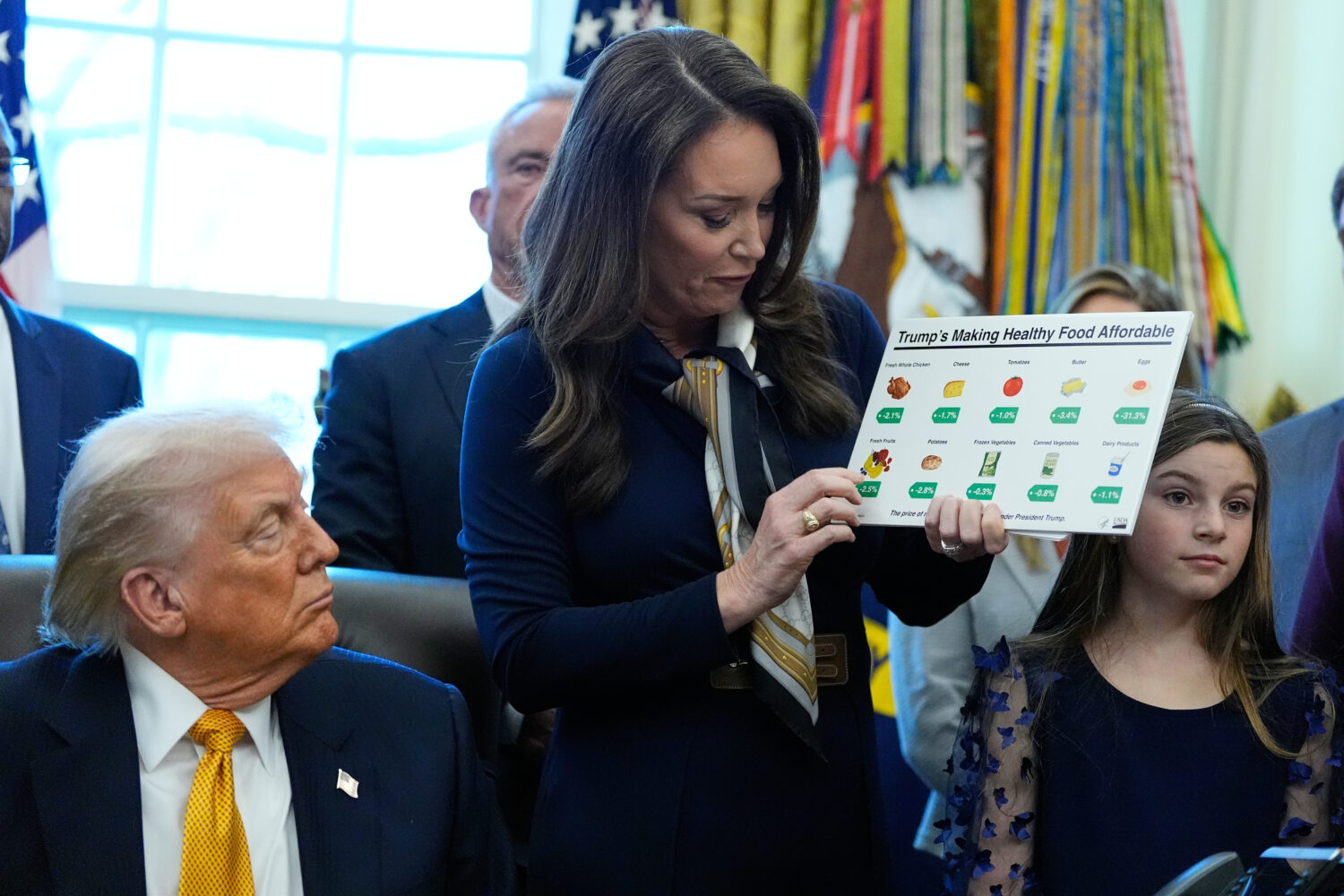 President Donald Trump listens as Agriculture Secretary Brooke Rollins speaks in the Oval Office of...