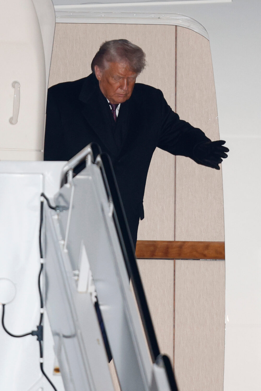 President Donald Trump arrives on Air Force One at Joint Base Andrews, Md., Thursday, Jan. 22, 2026...