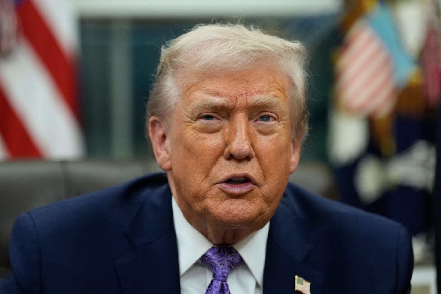 FILE - President Donald Trump speaks during a signing ceremony in the Oval Office of the White Hous...