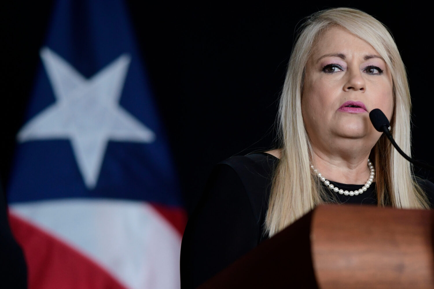 FILE - Governor Wanda Vázquez speaks at a press conference in San Juan, Puerto Rico, May 21, 2020....