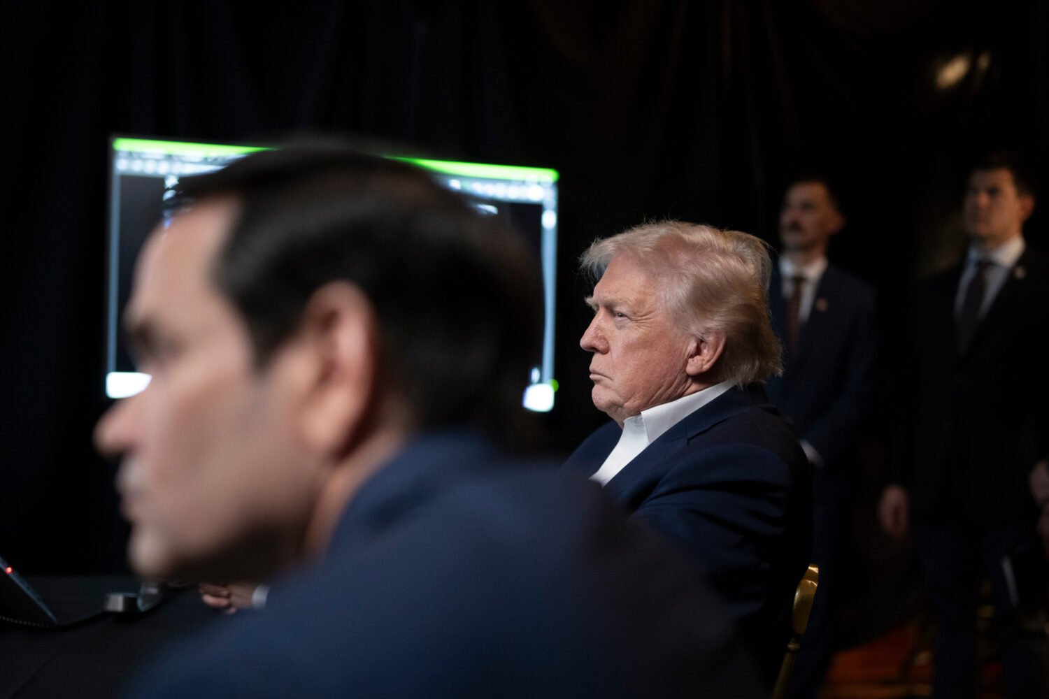 In this photo released by the White House, President Donald Trump monitors U.S. military operations...